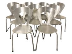 Nine brushed metal chairs