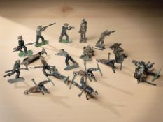 A small group of 20th century hand painted die cast lead figures of soldiers.
