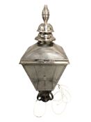 A chrome and glass lantern