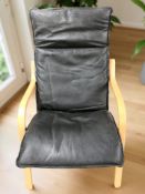 A Scandinavian and bentwood black leather armchair
