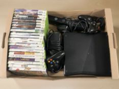An Xbox 360 console, leads, controllers, and various games.