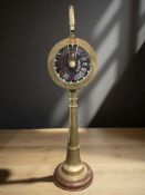 A brass ship's telegraph, height 111 cm including handle.