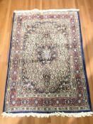 A Tabriz rug, 152 cm x 99 cm.