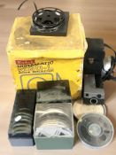 A Kodak Instamatic projector M60-L, a further Instamatic camera,