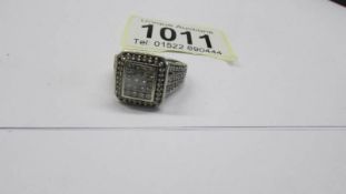A 1ct plus diamond ring in 9ct white gold square mount, size L, 6.86 grams.
