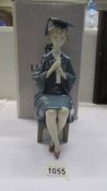 A boxed Lladro figure - Lady Graduate.