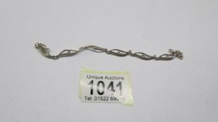 A pretty stone set silver bracelet.