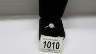 A 1.25ct round diamond ring set in yellow gold, size L, 2.1 grams.