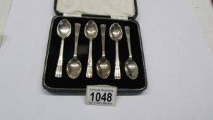 A cased set of silver teaspoons.