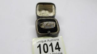A four section diamond panel ring, size R, 2.98 grams