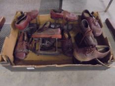 A quantity of WW1 orthopaedic shoes.