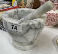 A marble pestle and mortar