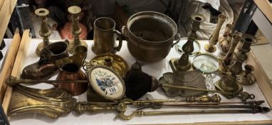 A selection of brass including candlesticks, fire irons, magnifying glasses etc