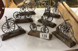 6 & 1 19th century Diecast bicycle models from The Holiday Inn Amsterdam