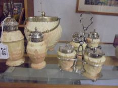 A Locke & Co., Worcester biscuit barrell, two cruets and two sugar castors.