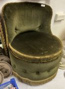A green upholstered bedroom chair