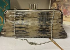 A snakeskin style ladies evening bag