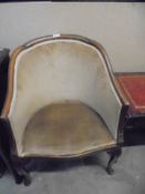 A Victorian mahogany tub chair.
