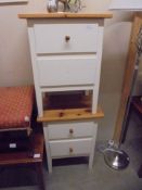 A pair of painted pine bedside chests, (one missing a knob)