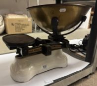 A vintage cast iron Avery shop / kitchen scales with brass pan (no weights)