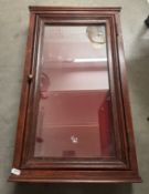 A mahogany table top jewellery display cabinet