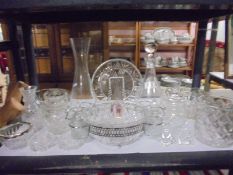 A shelf of vintage moulded glass.
