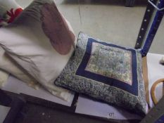 Four good quality cushions.