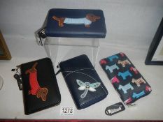 Four good ladies purses featuring dogs and dragonfly.