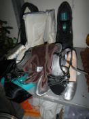 A mixed lot of gloves and shoes.