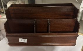 A polished mahogany letter rack desk tidy