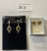 A pair of stone set 9ct gold ear pendants together with a pair of 9ct gold studs x2
