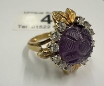 An 18ct yellow gold amethyst & diamond ring 8.72 grams