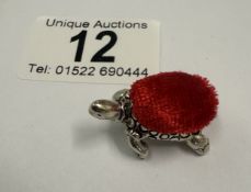 A silver pin cushion in the form of a tortoise 7 grams