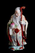 Porcelain sculpture "BUDDHA WITH SACRED PEACH"