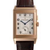 A FINE GENTLEMAN'S SIZE 18K SOLID ROSE GOLD JAEGER LECOULTRE REVERSO DUOFACE NIGHT & DAY WRIST WATCH