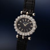 A LADY'S FINE 18K SOLID GOLD & DIAMOND PIAGET WRIST WATCH CIRCA 1970s, REF. 9330 RETAILED BY JEAN