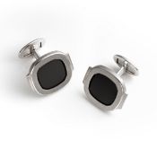 A PAIR OF 18K SOLID WHITE GOLD PATEK PHILIPPE NAUTILUS CUFFLINKS CIRCA 1990s, ACCOMPANIED BY ITS