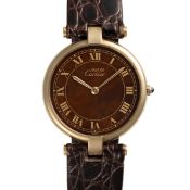 A GENTLEMAN'S SIZE SILVER GILT MUST DE CARTIER VENDOME WRIST WATCH CIRCA 1980s Movement: Quartz,