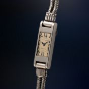 A FINE & RARE LADY'S PLATINUM CARTIER FRANCE COCKTAIL BRACELET WATCH CIRCA 1930s Movement: Manual 