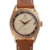 A GENTLEMAN'S SIZE 18K SOLID ROSE GOLD UNIVERSAL GENEVE POLEROUTER DATE WRIST WATCH CIRCA 1960