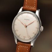 A RARE GENTLEMAN'S LARGE SIZE STAINLESS STEEL LONGINES CENTRE SECONDS WRIST WATCH CIRCA 1952, REF.