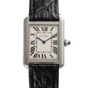 A LADY'S STAINLESS STEEL CARTIER TANK SOLO WRIST WATCH DATED 2016, REF. 3170 ACCOMPANIED BY THE