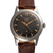 A GENTLEMAN'S SIZE STAINLESS STEEL HEUER DE LUXE SELF WINDING WRIST WATCH CIRCA 1950s, BLACK DIAL