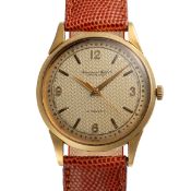 A RARE GENTLEMAN'S SIZE 18K SOLID GOLD IWC AUTOMATIC WRIST WATCH CIRCA 1950s, WITH GUILLOCHE DIAL