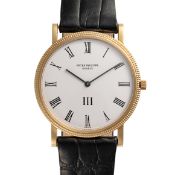 A GENTLEMAN'S SIZE 18K SOLID YELLOW GOLD PATEK PHILIPPE CALATRAVA WRIST WATCH CIRCA 1990s, REF. 3520