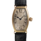 A GENTLEMAN'S SIZE 14K SOLID GOLD TONNEAU CASED OMEGA WRIST WATCH CIRCA 1920, REF. 519.655