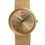 A GENTLEMAN'S SIZE 18K SOLID GOLD PATEK PHILIPPE CALATRAVA BRACELET WATCH DATED 1970, REF. 3520