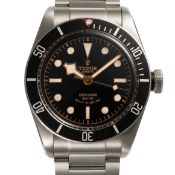 A GENTLEMAN'S SIZE STAINLESS STEEL TUDOR HERITAGE BLACK BAY SELF WINDING BRACELET WATCH DATED