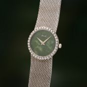 A LADY'S FINE 18K SOLID WHITE GOLD & DIAMOND PIAGET BRACELET WATCH CIRCA 1970s, REF. 9706 WITH