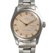 A MIDSIZE STAINLESS STEEL ROLEX OYSTER ROYAL BRACELET WATCH CIRCA 1950s, REF. 6244 WITH 